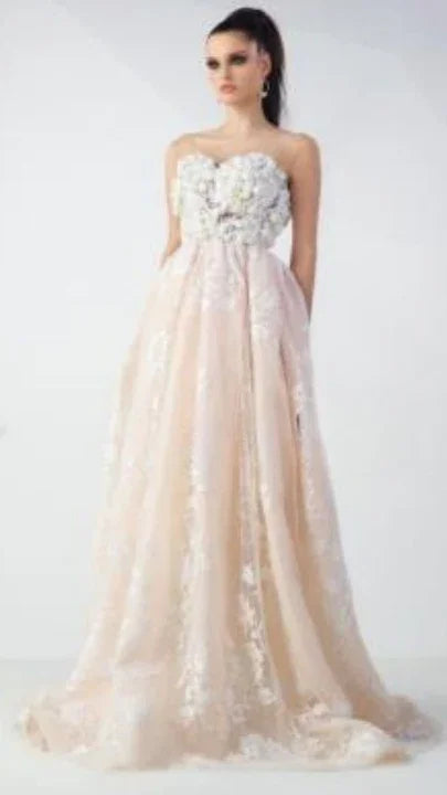 Elegant blush strapless gown with floral lace detailing, perfect for formal events and weddings
