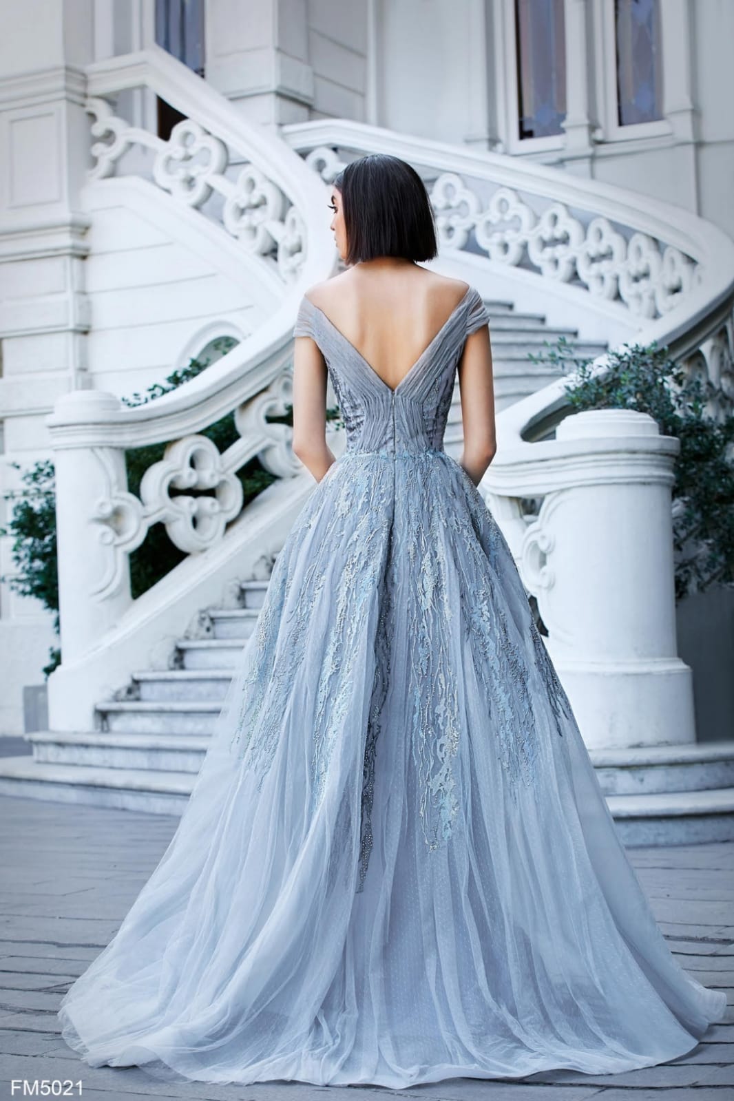 Back View of Blue Azzure Couture FM5021 Dress on model - Rofial Beauty