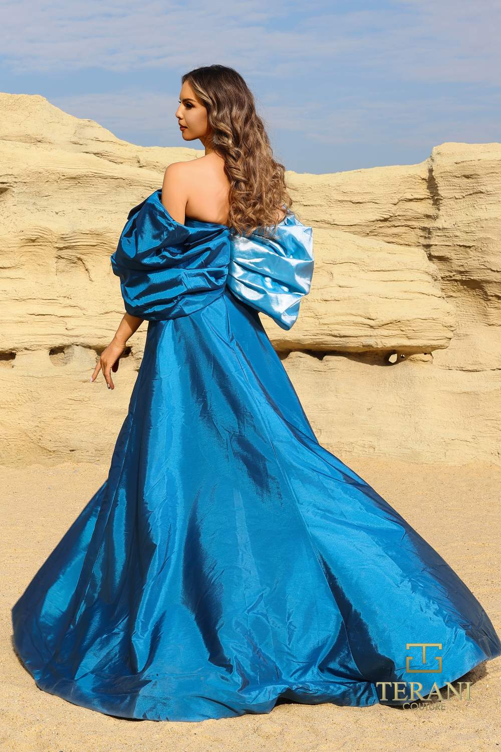 Terani Couture 252E5141 Blue Denim Taffeta Fit & Flare Evening Gown with Asymmetrical Neckline, Balloon Sleeves & Crystal Waist