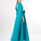 The back view of the model in the teal wrap dress, emphasizing the sleek design and tie waist, also offered in fuchsia and pistachio colors.