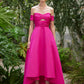 Front view of the model in the fuchsia gown that also comes in red, highlighting the ruched top and sweeping high-low hemline.