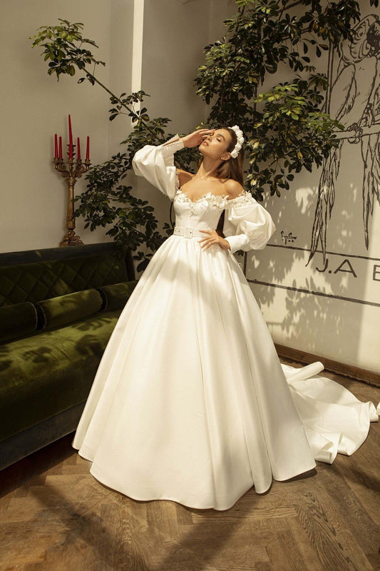 Enchanted Elegance Off-Shoulder Bridal Gown with Matching Veil