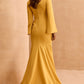 Elegant Mustard Yellow Bell Sleeve Gown with Floral Waist Detail