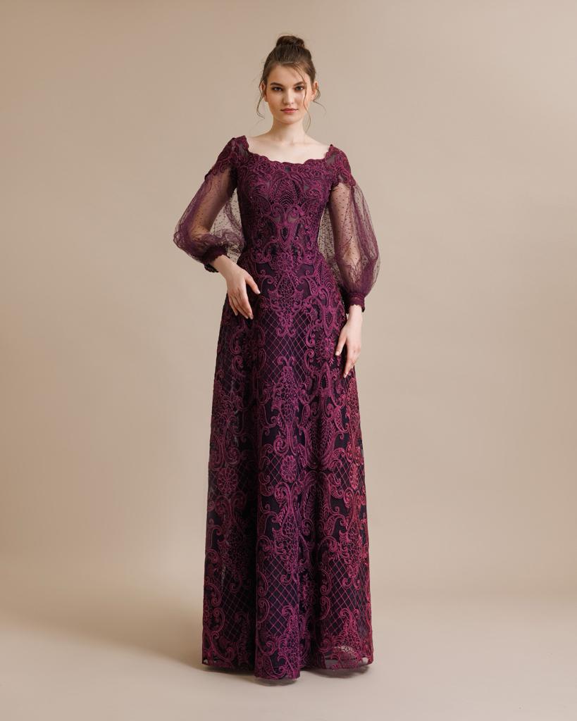 Front view of an aubergine floral lace gown with sheer balloon sleeves and a square neckline, highlighting the elegant full-length silhouette.
