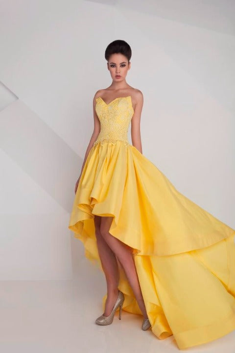 Model Wearing Gaby Charbachy GC 610 Yellow High-Low Dress - Rofial Beauty