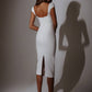 Back view of Olyamak Delis Ivory Dress - Rofial Beauty